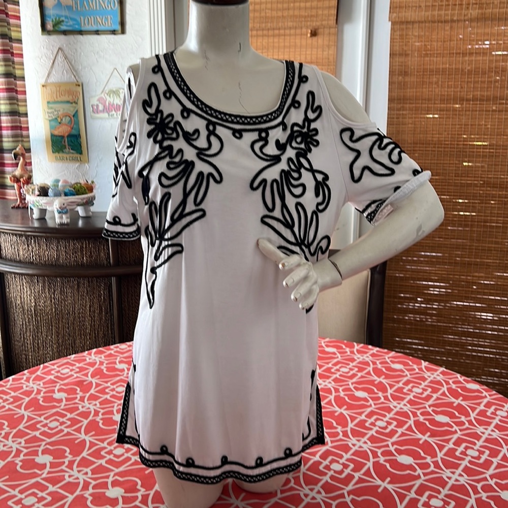 Open shoulder tunic top.  Size M
